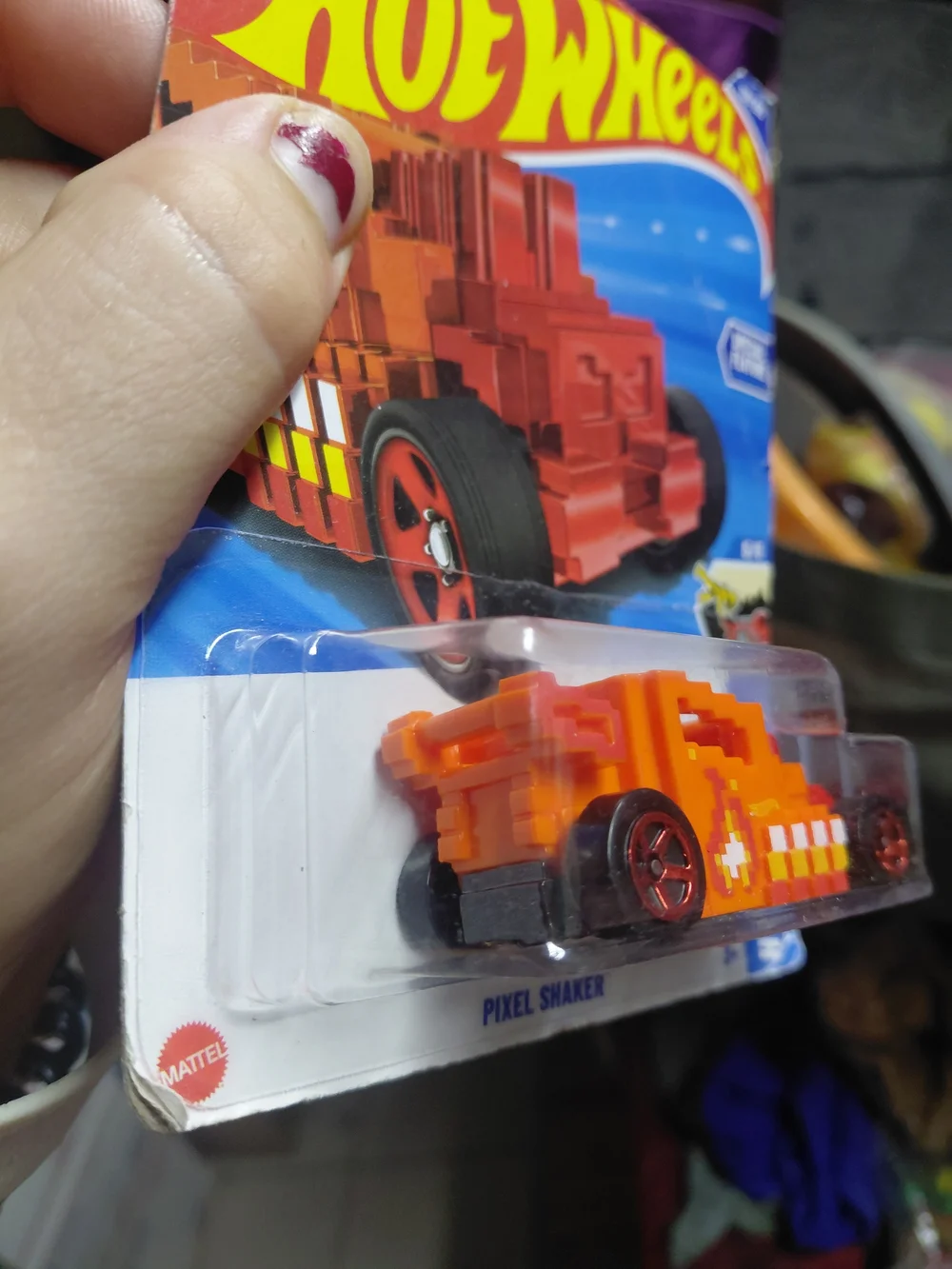 orange Hot Wheels Pixel Shaker diecast car (collector number 138/250, HW Ride-On